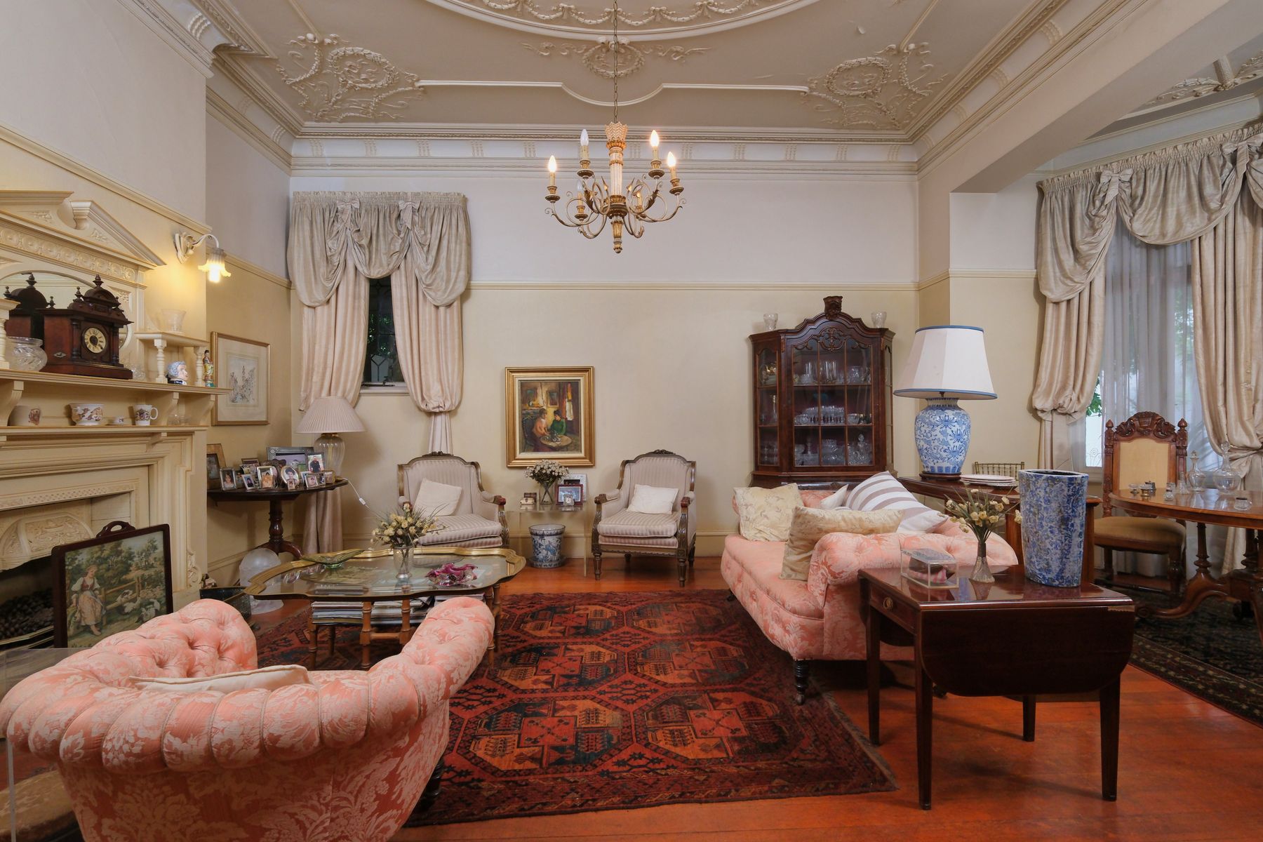 A warm, elegant home interior with vintage furnishings